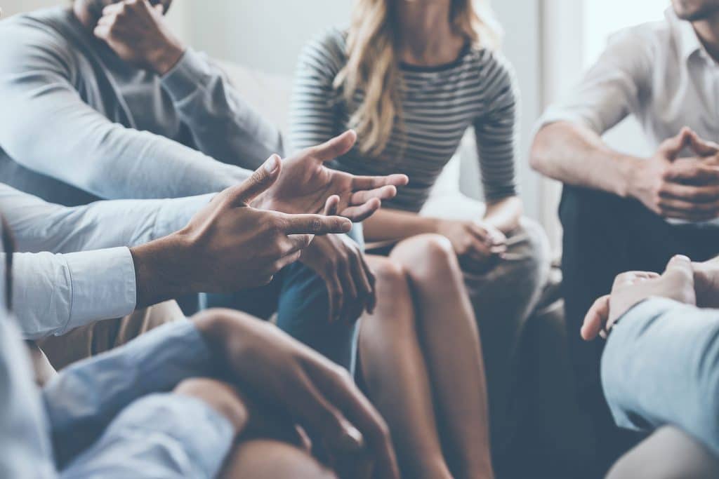 Interpreters working within a group of people